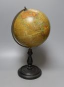 A Geographia 8 inch terrestrial globe, ebonised stand. 37cm tall