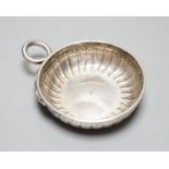 A late 18th/early 19th century French white metal taste vin, with engraved inscription and ring
