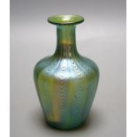 A Loetz style iridescent glass vase, flared narrow neck and bulbous body waved decoration,14 cms