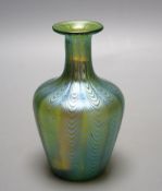 A Loetz style iridescent glass vase, flared narrow neck and bulbous body waved decoration,14 cms