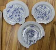 A group of three 18th century Chinese blue and white ‘squirrel, bamboo and vine’ chargers (a.f)