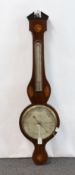 A George III inlaid mahogany wheel barometer and thermometer, the silvered dial marked Smith,