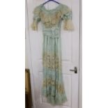 An Edwardian fine turquoise silk and ecru embroidered and lace ladies dress
