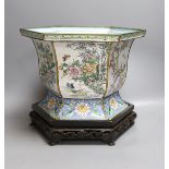 A Chinese Canton enamel jardiniere on hardwood stand, total height 23cm