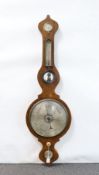 A Victorian rosewood wheel barometer and thermometer, with engraved silvered dials, height 103cm