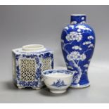 A Chinese blue and white prunus vase, four character mark, height 19cm and two other blue and