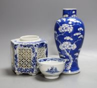 A Chinese blue and white prunus vase, four character mark, height 19cm and two other blue and