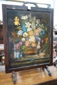 An early 20th century painted fire screen inset still life oil on canvas, width 66cm, height 94cm