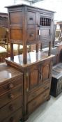 A reproduction oak television cabinet together with a smaller hutch cabinet, larger width 81cm,