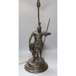 A bronze ‘gladiator’ lamp base. Total height 62cm