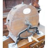 A Victorian cast iron mounted mahogany knife polisher, height 44cm