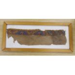 A pre-Columbian grave textile, framed,