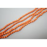 A single strand graduated coral bead necklace, 154cm, gross weight 48 grams.