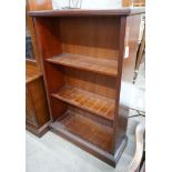 A reproduction mahogany open bookcase, width 90cm, depth 34cm, height 137cm