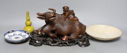 A Chinese studio pottery dish together with another two Chinese ceramics and a wood ox group, 26cm