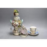 A Dresden floral encrusted pot pourri vase and cover, 29cm tall, a figure of a lady and a Dresden