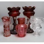 A pair of late 19th century ruby glass lustres, 30cm tall, cranberry jug, Bohemian vase and one