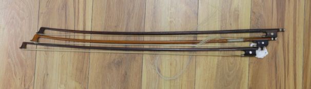 Three nickel mounted violin bows, one stamped R. R. Shields, two with ivory veneered tip - longest