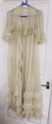 A fine cream silk and lace inserted lady's negligee