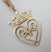 A 1970's Scottish 9ct gold Iona heart shaped pendant, 46mm, on a 9ct gold chain, 74cm,27.6 grams.