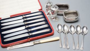 A pair of Victorian silver pepperettes, a pair of later silver salts, six silver teaspoons, a silver