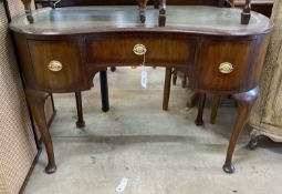A 1920's kidney shaped writing table, width 110cm, depth 50cm, height 78cm