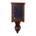 An Edwardian mahogany hanging corner cabinet, width 33cm height 90cm