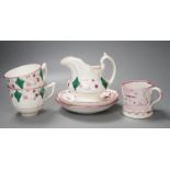 A collection of Welsh or English pink lustre pottery tea wares, first half 19th century
