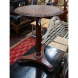 A Gillows style circular mahogany wine table, diameter 50cm height 71cm