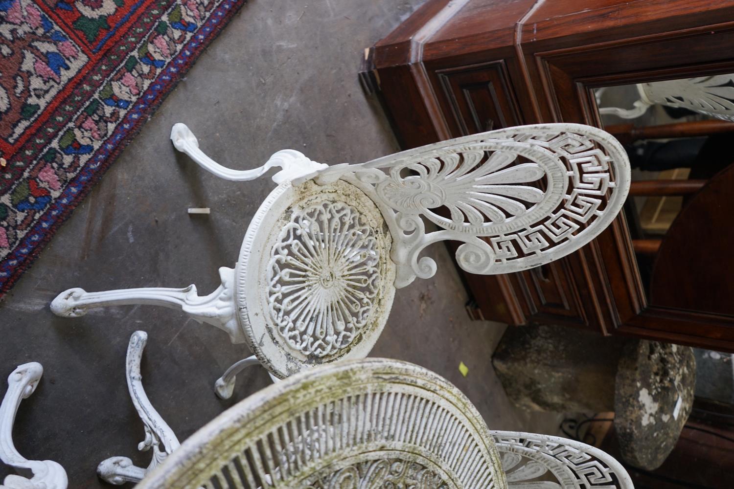 A Victorian style painted aluminium garden table and four chairs, table diameter 80cm height 69cm - Image 3 of 3