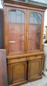 A Victorian mahogany bookcase, width 121cm depth 46cm height 224cm