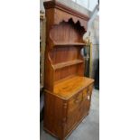 A small Victorian pine dresser, width 95cm depth 41cm height 193cm