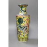 A late 19th century Chinese famille verte ‘lion dog’ vase - 34cm