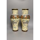A large pair of Japonaise phoenix decorated baluster vases,38 cms high.
