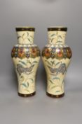 A large pair of Japonaise phoenix decorated baluster vases,38 cms high.