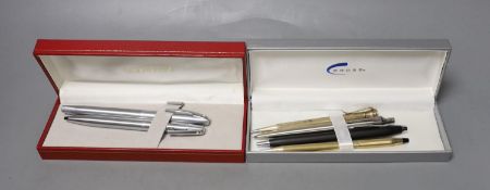 A Shaeffer fountain pen set and 4 others