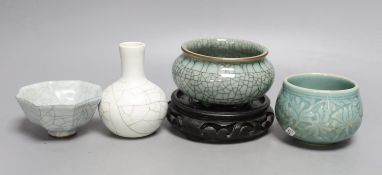 Three Chinese crackle glaze vessels, a Korean celadon pot and a hardwood stand