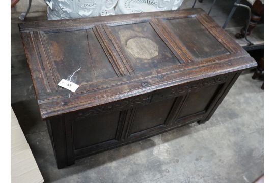 A late 17th century carved oak coffer, width 102cm depth 51cm height 50cm - Image 1 of 3