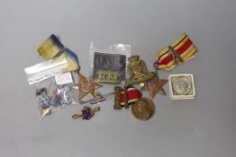 A WWII Atlantic Star, Africa Star, WWI The Kings Medal, German Signal Flag Tinnies, cap badges,