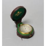 A cased Dolland pocket barometer