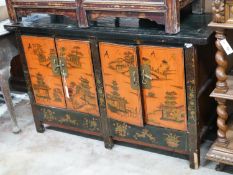 A Chinese lacquered low cabinet, width 112cm depth 41cm height 75cm