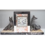 An Art Deco French spelter and marble mantel clock, 46cm wide