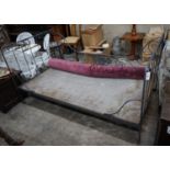 A late Victorian wrought iron bed frame, length 188cm depth 110cm height 96cm