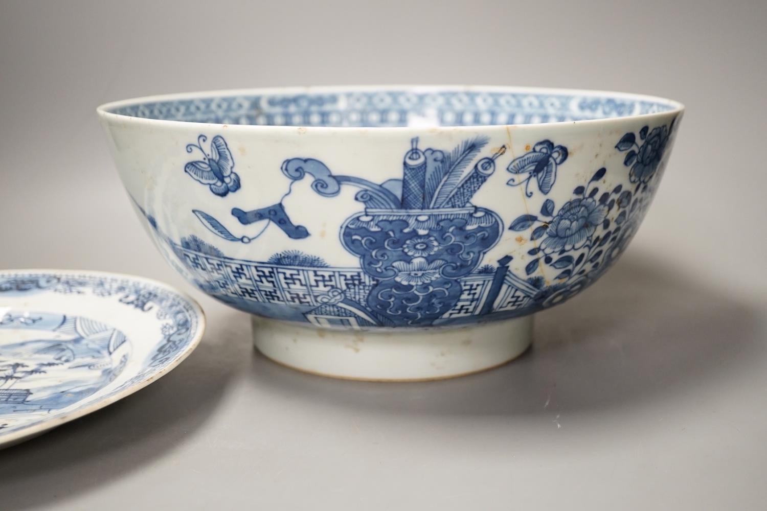 An 18th century Chinese blue and white punch bowl and similar plate. Largest 29cm - Image 4 of 6