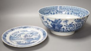 An 18th century Chinese blue and white punch bowl and similar plate. Largest 29cm