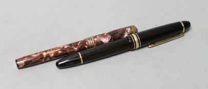 A Mont Blanc Meisterstuck fountain pen and one other fountain pen.