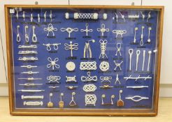 A cased display of nautical knots