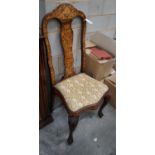An early 18th century Dutch walnut and floral marquetry dining chair
