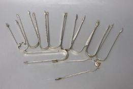 Ten assorted late 18th/early 19th century pairs of silver sugar tongs, various patterns, dates and