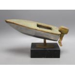 A brass and aluminium model of a speedboat on marble base, 30cm